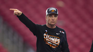 Jan 1, 2022; Glendale, Arizona, USA; Oklahoma State Cowboys head coach Mike Gundy celebrates after