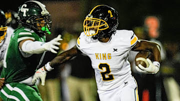 Detroit King running back Michael Dukes (2) runs against Cass Tech during the first half at Cass Tech High School in Detroit on Friday, Sept. 20, 2024.