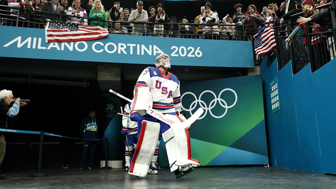 Connor Hellebuyck walks into the arena before the game against Latvia in men's ice hockey group C play during the Milano Cortina 2026 Olympic Winter Games.