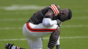 Cleveland Browns linebacker Jeremiah Owusu-Koramoah (6) pauses for a moment of reflection during the first half of an NFL football game at Huntington Bank Field, Sunday, Sept. 22, 2024, in Cleveland, Ohio.
