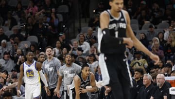 San Antonio Spurs react after a 3-point shot against the Golden State Warriors. 