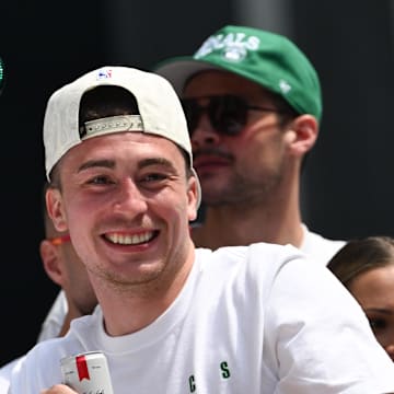 Jun 21, 2024; Boston, MA, USA; Boston Celtics guard Payton Pritchard (11) rides in a duck boat  during the 2024 NBA Championship parade in Boston. Mandatory Credit: Brian Fluharty-Imagn Images