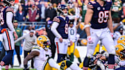 In the background, Jordan Love celebrates Karl Brooks' game-saving blocked field goal at Chicago last year.