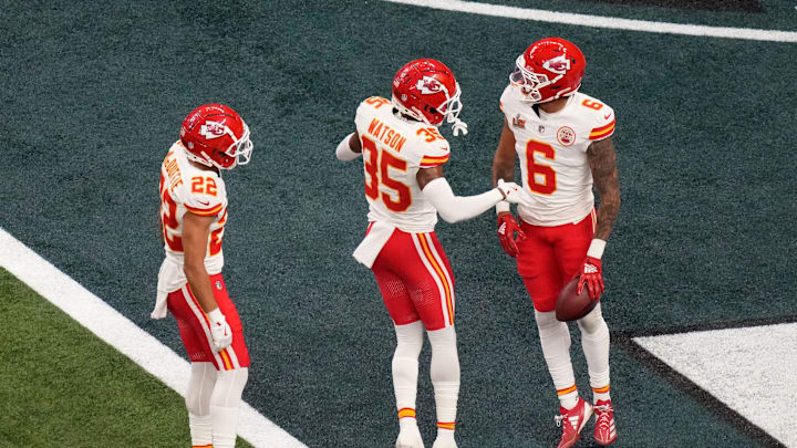 Feb 9, 2025; New Orleans, LA, USA; Kansas City Chiefs safety Bryan Cook (6) reacts with cornerback Jaylen Watson (35) and cornerback Trent McDuffie (22) after an interception during the second quarter in Super Bowl LIX  against the Philadelphia Eagles at Caesars Superdome. Mandatory Credit: Kirby Lee-Imagn Images