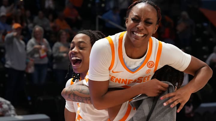 Tennessee's Samara Spencer (7) is carried off the court by Ruby Whitehorn (2) and Zee Spearman (11) Tennessee's Samara Spencer (7) is carried off the court by Ruby Whitehorn (2) and Zee Spearman (11)