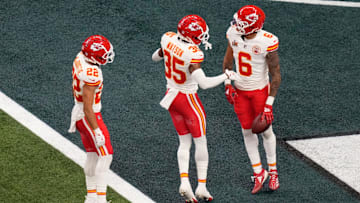 Feb 9, 2025; New Orleans, LA, USA; Kansas City Chiefs safety Bryan Cook (6) reacts with cornerback Jaylen Watson (35) and cornerback Trent McDuffie (22) after an interception during the second quarter in Super Bowl LIX  against the Philadelphia Eagles at Caesars Superdome. Mandatory Credit: Kirby Lee-Imagn Images