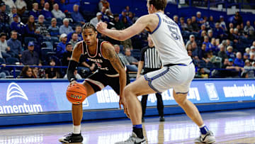 Feb 22, 2025; Colorado Springs, Colorado, USA; Fresno State Bulldogs forward Elijah Price (3) controls the ball as Air Force Falcons center Wesley Celichowski (51) guards in the second half at Clune Arena. Mandatory Credit: Isaiah J. Downing-Imagn Images