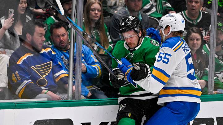 Feb 4, 2026; Dallas, Texas, USA; St. Louis Blues defenseman Colton Parayko (55) checks Dallas Stars center Sam Steel (18) during the third period at the American Airlines Center. Mandatory Credit: Jerome Miron-Imagn Images