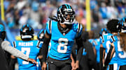 Oct 26, 2025; Charlotte, North Carolina, USA; Carolina Panthers cornerback Jaycee Horn (8) runs on to the field before the game at Bank of America Stadium. 