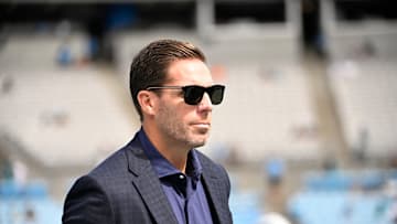 Oct 5, 2025; Charlotte, North Carolina, USA; Carolina Panthers general manager Dan Morgan on the field before the gsme at Bank of America Stadium. 