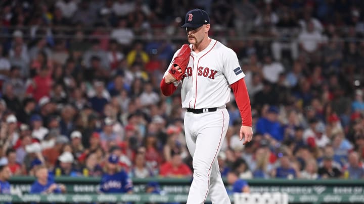 Aug 13, 2024; Boston, Massachusetts, USA; Boston Red Sox pitcher Cam Booser (71) is taken out of the game during the sixth inning against the Texas Rangers at Fenway Park.