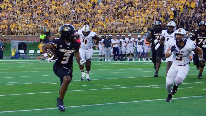 Aug. 29, 2024: WR Luther Burden carries the ball into the end zone for a touchdown against Murray State. 