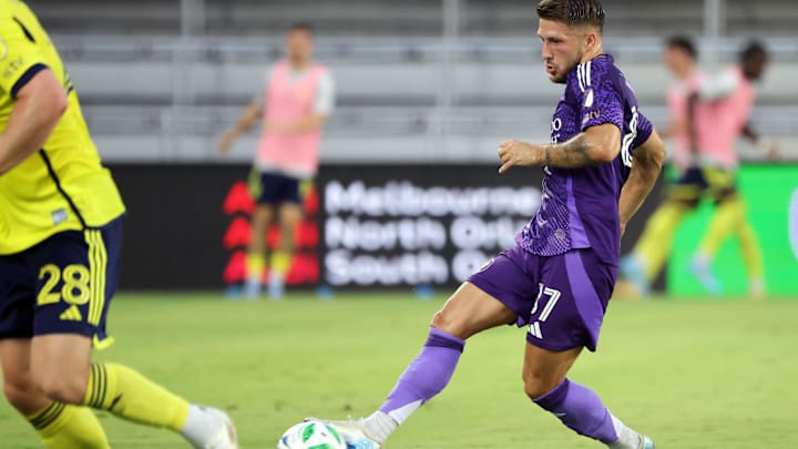 May 21, 2025; Orlando, Florida, USA; Orlando City forward Marco Pasalic (87) passes against the Nashville SC during the first half at Inter&Co Stadium. Mandatory Credit: Kim Klement Neitzel-Imagn Images