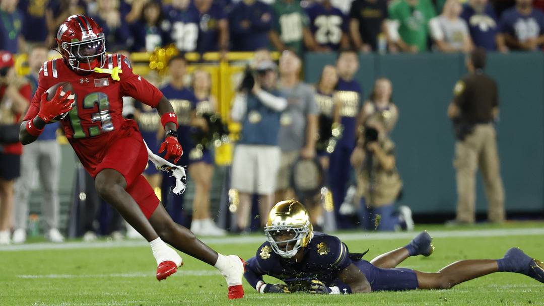 Sep 6, 2026; Green Bay, Wisconsin, USA; Wisconsin Badgers wide receiver Eugene Hilton Jr. (13) makes a catch against the Notre Dame Fighting Irish in the first half at Lambeau Field. Mandatory Credit: Michael Caterina-Imagn Images Sep 6, 2026; Green Bay, Wisconsin, USA; Wisconsin Badgers wide receiver Eugene Hilton Jr. (13) makes a catch against the Notre Dame Fighting Irish in the first half at Lambeau Field. Mandatory Credit: Michael Caterina-Imagn Images