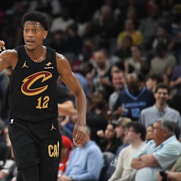 Mar 14, 2025; Memphis, Tennessee, USA; Cleveland Cavaliers small forward De'Andre Hunter (12) celebrates after making a three-pointer in the 1st quarter of the Cleveland Cavaliers vs. Memphis Grizzlies at FedExForum. Mandatory Credit: Matthew Smith-Imagn Images