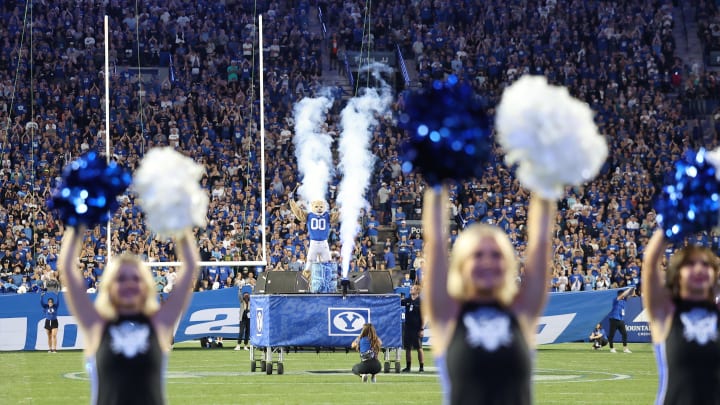 Sep 29, 2022; Provo, Utah, USA; Brigham Young Cougars mascot Cosmo performs between the third and fourth quarters in a game against the Utah State Aggies at LaVell Edwards Stadium. Mandatory Credit: Rob Gray-USA TODAY Sports