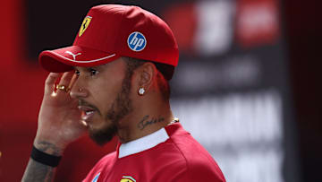 Lewis Hamilton of Scuderia Ferrari  looks on during previews...