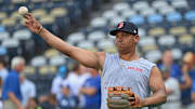 Aug 5, 2024; Kansas City, Missouri, USA;  Boston Red Sox third baseman Rafael Devers (11) warms up before a game against the Kansas City Royals at Kauffman Stadium. Mandatory Credit: Peter Aiken-Imagn Images