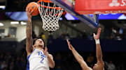 Mar 8, 2025; Pittsburgh, Pennsylvania, USA;  Pittsburgh Panthers forward Cameron Corhen (2) shoots against Boston College Eagles guard Donald Hand Jr. (13) during the first half at the Petersen Events Center. Mandatory Credit: Charles LeClaire-Imagn Images