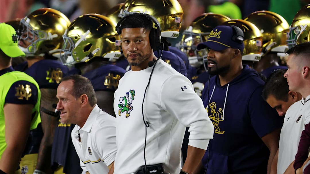 Sep 13, 2025; South Bend, Indiana, USA; Notre Dame Fighting Irish head coach Marcus Freeman looks on during the first half against the Texas A&M Aggies at Notre Dame Stadium. Mandatory Credit: Trevor Ruszkowski-Imagn Images