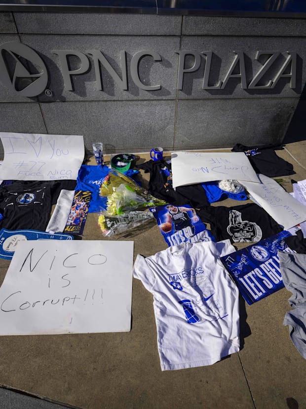 Dallas Mavericks fans leave notes and memorabilia to protest the trade of Mavericks point guard Luka Doncic to the LA Lakers