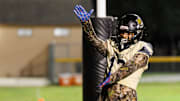 Buchholz Bobcats wide receiver and Florida Gators commit Justin Williams (13) gestures with a Gator Chomp.