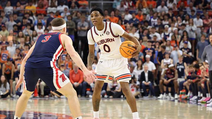 Feb 26, 2025; Auburn, Alabama, USA;  Mississippi Rebels guard Sean Pedulla (3) guards Auburn Tigers guard Tahaad Pettiford (0) during the second half at Neville Arena. Mandatory Credit: John Reed-Imagn Images