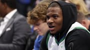 Dallas Cowboys linebacker Micah Parsons sits courtside before the game between the Dallas Mavericks and Brooklyn Nets.