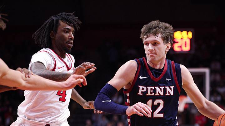 Dec 20, 2025; Piscataway, New Jersey, USA; Penn Quakers forward TJ Power (12) goes to the basket against Rutgers Scarlet Knights.