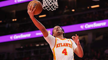 Former Atlanta Hawks guard Kobe Bufkin (4) shoots against the New Orleans Pelicans in the second quarter at State Farm Arena. 