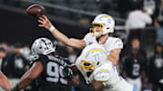 Sep 15, 2025; Paradise, Nevada, USA; Los Angeles Chargers quarterback Justin Herbert (10) makes a pass during the fourth quarter against the Las Vegas Raiders at Allegiant Stadium. Mandatory Credit: Kiyoshi Mio-Imagn Images
