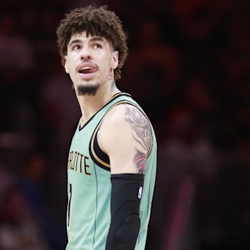 Mar 23, 2025; Miami, Florida, USA;  Charlotte Hornets guard LaMelo Ball (1) reacts against the Miami Heat during the second half at Kaseya Center. Mandatory Credit: Rhona Wise-Imagn Images