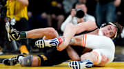 Iowa’s Drake Ayala wrestles Illinois’ Lucas Byrd in a 133-pound match on Friday, Jan. 17, 2025, at Carver-Hawkeye Arena in Iowa City, Iowa.
