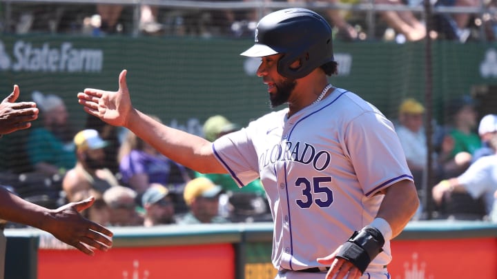 May 23, 2024; Oakland, California, USA; Colorado Rockies catcher Elias Diaz  (35) celebrates after scoring a run against the Oakland Athletics during the eleventh inning at Oakland-Alameda County Coliseum. Mandatory Credit: Kelley L Cox-USA TODAY Sports