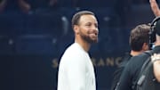 Sep 20, 2025; San Francisco, CA, USA;  Golden State Warriors guard Stephen Curry walks to do the the coin toss at the Laver Cup at Chase Center. Mandatory Credit: David Gonzales-Imagn Images