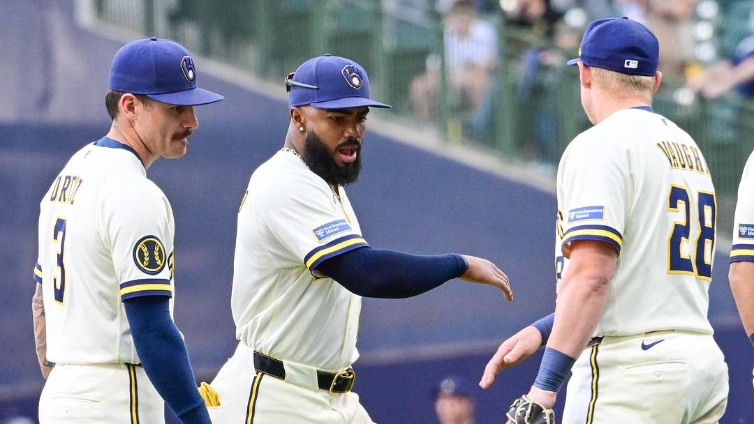 May 14, 2026; Milwaukee, Wisconsin, USA; Milwaukee Brewers third baseman Luis Rengifo (13) celebrates with shortstop Joey Ortiz (3) and first baseman Andrew Vaughn (28) after defeating the San Diego Padres at American Family Field. Mandatory Credit: Benny Sieu-Imagn Images