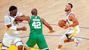 Jun 2, 2022; San Francisco, California, USA; Golden State Warriors guard Stephen Curry (30) shoots the ball against Boston Celtics center Al Horford (42) in game one of the 2022 NBA Finals at Chase Center. Mandatory Credit: Cary Edmondson-Imagn Images