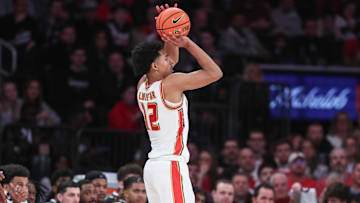 Feb 1, 2025; New York, New York, USA;  St. John's basketball guard RJ Luis Jr. (12) takes a three point shot in the first half against the Providence Friars at Madison Square Garden.