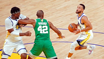 Jun 2, 2022; San Francisco, California, USA; Golden State Warriors guard Stephen Curry (30) shoots the ball against Boston Celtics center Al Horford (42) in game one of the 2022 NBA Finals at Chase Center. Mandatory Credit: Cary Edmondson-Imagn Images