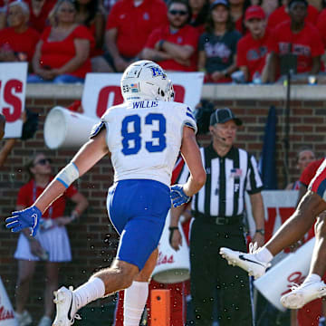 Sep 7, 2024; Oxford, Mississippi, USA; Mississippi Rebels defensive back John Saunders Jr. (5) intercept a pass in the end zone during the second half against the Middle Tennessee Blue Raiders at Vaught-Hemingway Stadium. Mandatory Credit: Petre Thomas-Imagn Images