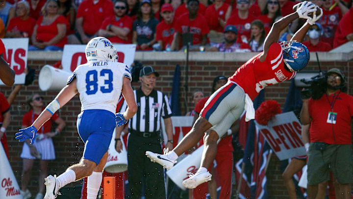 Sep 7, 2024; Oxford, Mississippi, USA; Mississippi Rebels defensive back John Saunders Jr. (5) intercept a pass in the end zone during the second half against the Middle Tennessee Blue Raiders at Vaught-Hemingway Stadium. Mandatory Credit: Petre Thomas-Imagn Images