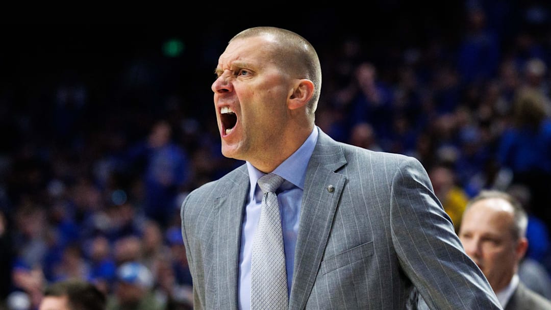 Jan 7, 2026; Lexington, Kentucky, USA; Kentucky Wildcats head coach Mark Pope yells across the court during the first half against the Missouri Tigers at Rupp Arena at Central Bank Center. Mandatory Credit: Jordan Prather-Imagn Images
