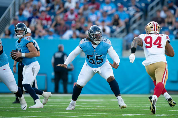 Tennessee Titans offensive tackle JC Latham gets ready to block during a preseason game against the San Francisco 49ers.