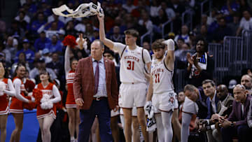 Mar 22, 2025; Denver, CO, USA; Wisconsin Badgers head coach Kevin Young reacts during the second half in the second round of the NCAA Tournament  at Ball Arena. Mandatory Credit: Isaiah J. Downing-Imagn Images