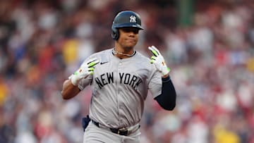 Jul 27, 2024; Boston, Massachusetts, USA; New York Yankees left fielder Juan Soto (22) reacts to hitting a two-run home run against the Boston Red Sox during the first inning at Fenway Park. Mandatory Credit: Gregory Fisher-Imagn Images