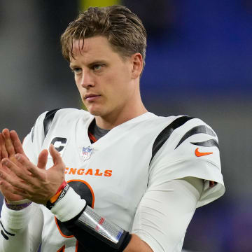 Cincinnati Bengals quarterback Joe Burrow (9) claps for his team during warmups before the first quarter of the NFL Week 11 game between the Baltimore Ravens and the Cincinnati Bengals at M&T Bank Stadium in Baltimore on Thursday, Nov. 16, 2023.