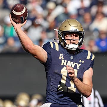 Oct 26, 2024; East Rutherford, New Jersey, USA; Navy Midshipmen quarterback Blake Horvath (11) passes the ball during the second half against the Notre Dame Fighting Irish at MetLife Stadium. Mandatory Credit: Vincent Carchietta-Imagn Images