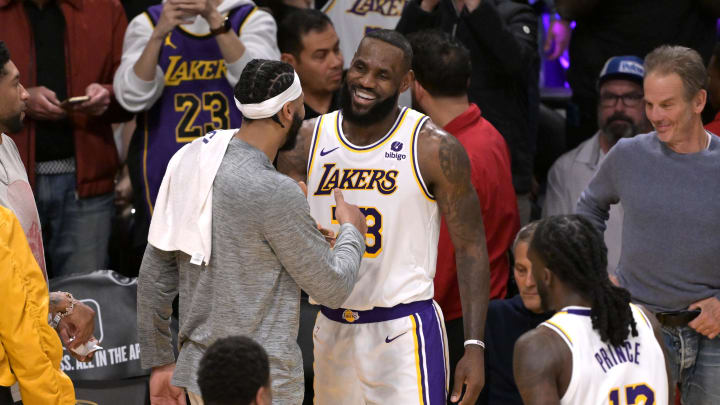 Mar 2, 2024; Los Angeles, California, USA; Los Angeles Lakers forward LeBron James (23) is congratulated by forward Anthony Davis (3) after scoring his 40,000th career point against the Denver Nuggets at Crypto.com Arena. Mandatory Credit: Jayne Kamin-Oncea-USA TODAY Sports