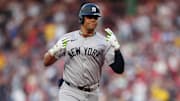 Jul 27, 2024; Boston, Massachusetts, USA; New York Yankees left fielder Juan Soto (22) reacts to hitting a two-run home run against the Boston Red Sox during the first inning at Fenway Park. Mandatory Credit: Gregory Fisher-Imagn Images