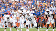 Sep 14, 2024; Gainesville, Florida, USA; Texas A&M Aggies quarterback Marcel Reed (10) prepares to hike the ball against the Florida Gators during the first half at Ben Hill Griffin Stadium. Mandatory Credit: Matt Pendleton-Imagn Images